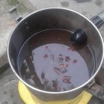 Discoloured water sample from an underground tank before cleaning in Kasba, Kolkata