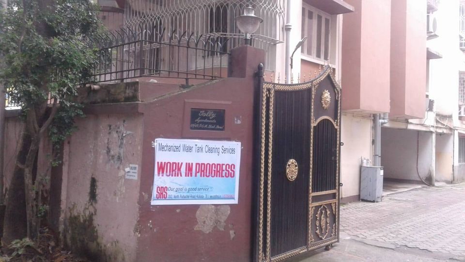 SRS work-in-progress notice at a Kolkata housing society gate