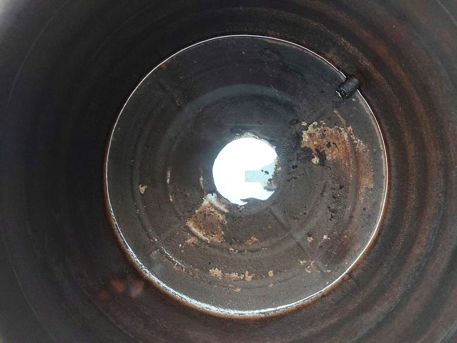 Underground tank before mechanized cleaning